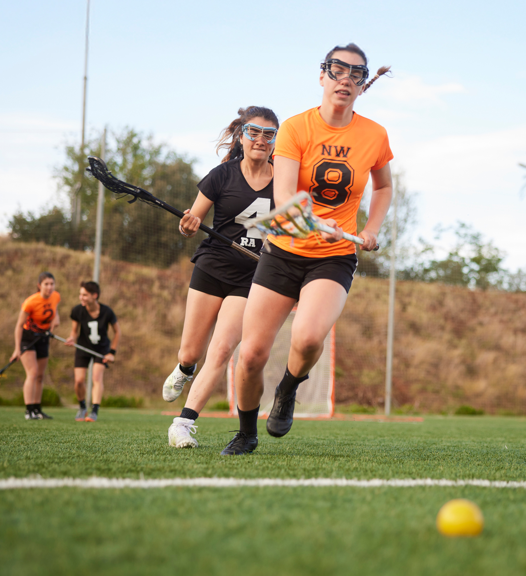 girls playing lacrosse