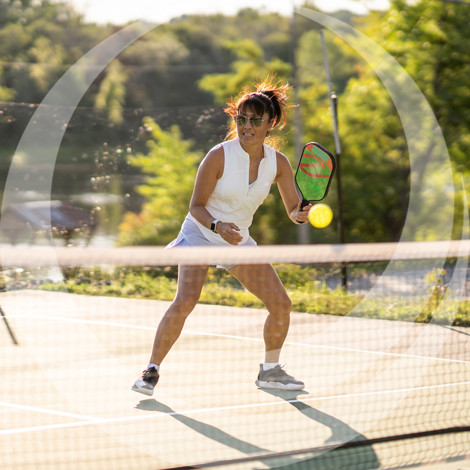 woman playing pickleball