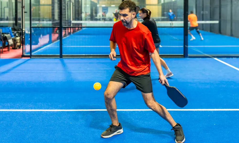 man playing pickleball