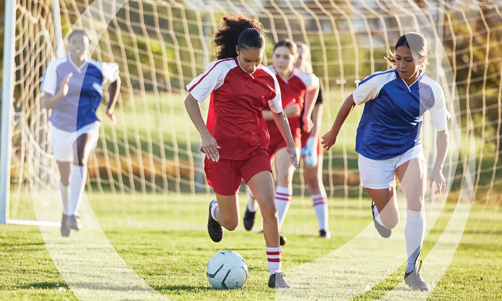 girls playing soccer