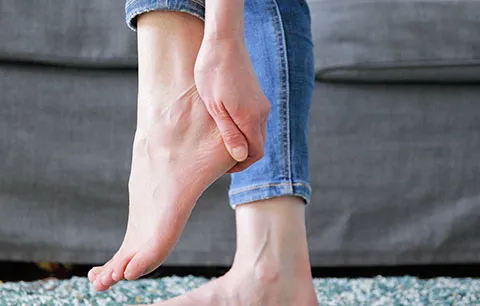 Woman with heel pain