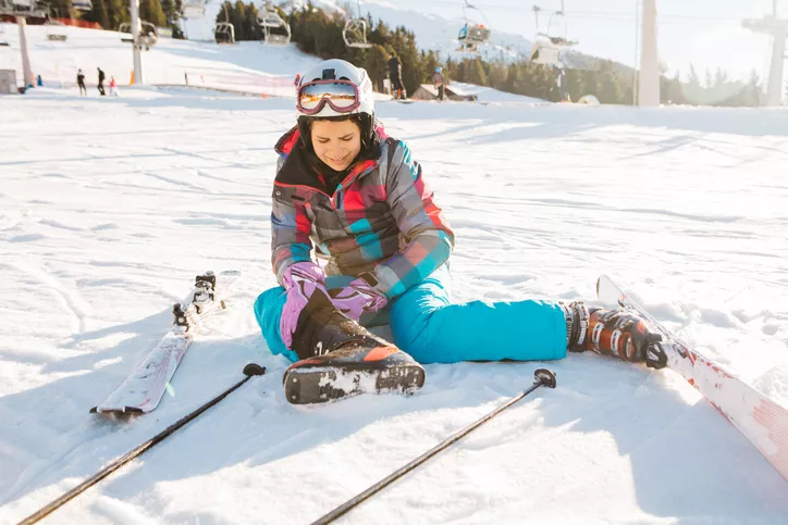Woman with a skiing injury